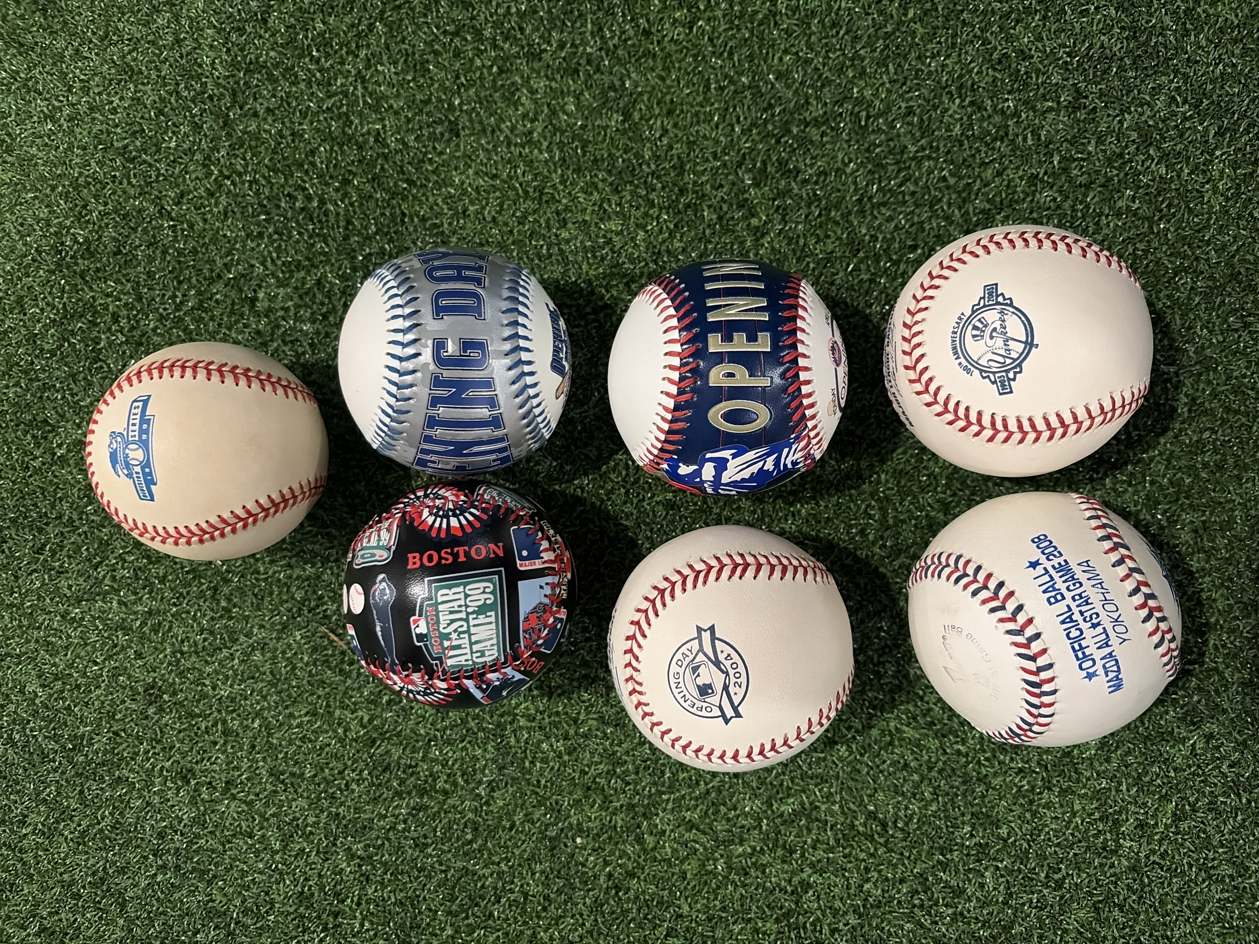 Collection of Seven MLB Commemorative Baseballs Various Eras